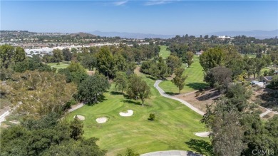 This Single Story home is nestled amidst gently rolling hills in on Vista Valencia Golf Course in California - for sale on GolfHomes.com, golf home, golf lot