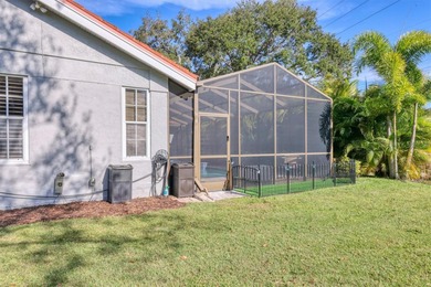 Walk through the front gate and courtyard to discover refined on The Meadows Golf and Country Club in Florida - for sale on GolfHomes.com, golf home, golf lot