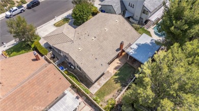 This Single Story home is nestled amidst gently rolling hills in on Vista Valencia Golf Course in California - for sale on GolfHomes.com, golf home, golf lot