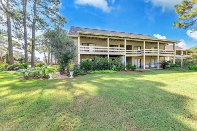 Lots of natural light streams into this cheerful beach retreat on Seascape Golf Course in Florida - for sale on GolfHomes.com, golf home, golf lot