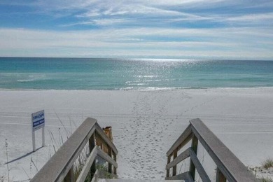Lots of natural light streams into this cheerful beach retreat on Seascape Golf Course in Florida - for sale on GolfHomes.com, golf home, golf lot