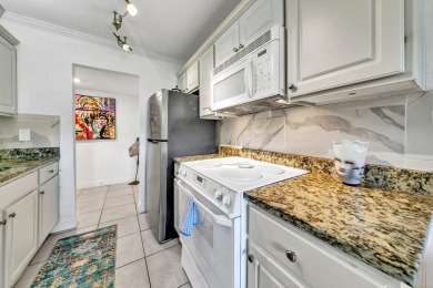 Lots of natural light streams into this cheerful beach retreat on Seascape Golf Course in Florida - for sale on GolfHomes.com, golf home, golf lot