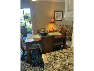 Lots of natural light streams into this cheerful beach retreat on Seascape Golf Course in Florida - for sale on GolfHomes.com, golf home, golf lot