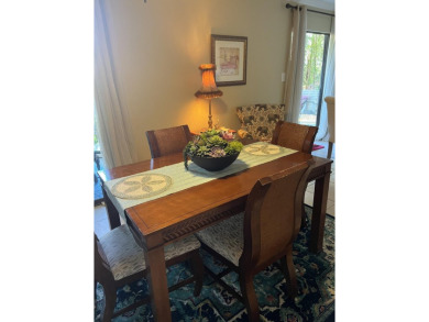 Lots of natural light streams into this cheerful beach retreat on Seascape Golf Course in Florida - for sale on GolfHomes.com, golf home, golf lot