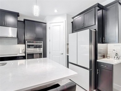 Exceptional BASTA model, BETTER THAN NEW,  built in 2022 on an on Stonegate Golf Club in Florida - for sale on GolfHomes.com, golf home, golf lot