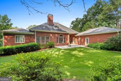 Welcome to this custom-built 4-bedroom, 3 1/2 bath all-brick on Canongate At Georgia National Golf Club in Georgia - for sale on GolfHomes.com, golf home, golf lot