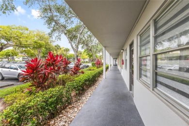 !! LOCATED ON THE FIRST FLOOR ... AND WITH GOLF COURSE VIEW on Flamingo Lakes Country Club in Florida - for sale on GolfHomes.com, golf home, golf lot