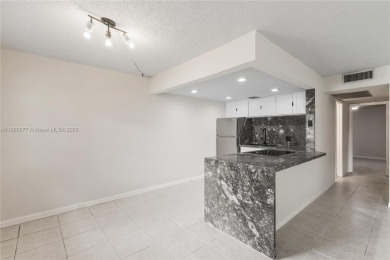 !! LOCATED ON THE FIRST FLOOR ... AND WITH GOLF COURSE VIEW on Flamingo Lakes Country Club in Florida - for sale on GolfHomes.com, golf home, golf lot