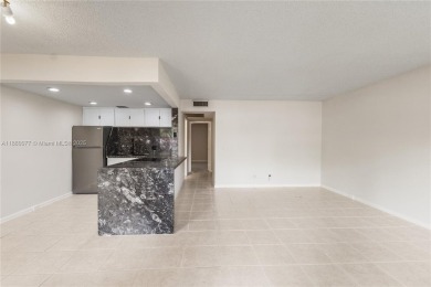 !! LOCATED ON THE FIRST FLOOR ... AND WITH GOLF COURSE VIEW on Flamingo Lakes Country Club in Florida - for sale on GolfHomes.com, golf home, golf lot