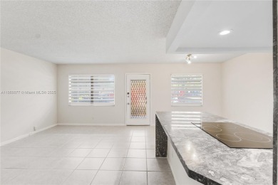 !! LOCATED ON THE FIRST FLOOR ... AND WITH GOLF COURSE VIEW on Flamingo Lakes Country Club in Florida - for sale on GolfHomes.com, golf home, golf lot