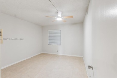 !! LOCATED ON THE FIRST FLOOR ... AND WITH GOLF COURSE VIEW on Flamingo Lakes Country Club in Florida - for sale on GolfHomes.com, golf home, golf lot