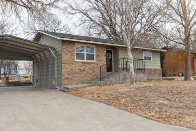 This beautifully maintained 5-bedroom, 2-bath home is as on Point Rock Golf Club in Kansas - for sale on GolfHomes.com, golf home, golf lot