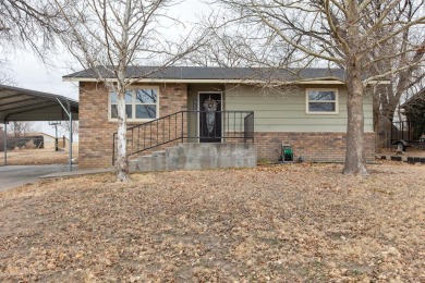 This beautifully maintained 5-bedroom, 2-bath home is as on Point Rock Golf Club in Kansas - for sale on GolfHomes.com, golf home, golf lot