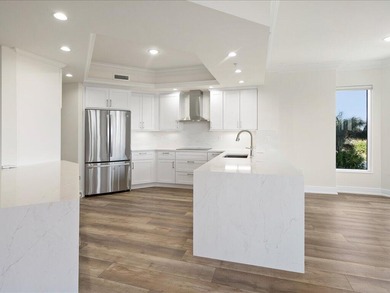 THIS CONDOMINIUM SOUNDS LIKE A DREAM COME TRUE. THE COMBINATION on Hammock Bay in Florida - for sale on GolfHomes.com, golf home, golf lot