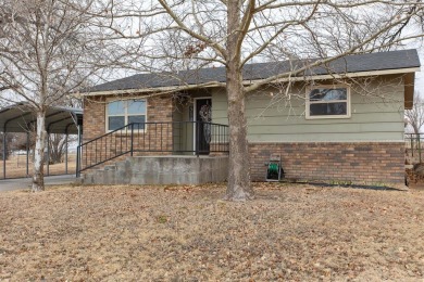 This beautifully maintained 5-bedroom, 2-bath home is as on Point Rock Golf Club in Kansas - for sale on GolfHomes.com, golf home, golf lot