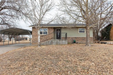 This beautifully maintained 5-bedroom, 2-bath home is as on Point Rock Golf Club in Kansas - for sale on GolfHomes.com, golf home, golf lot