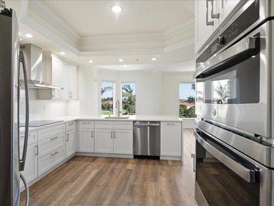 THIS CONDOMINIUM SOUNDS LIKE A DREAM COME TRUE. THE COMBINATION on Hammock Bay in Florida - for sale on GolfHomes.com, golf home, golf lot