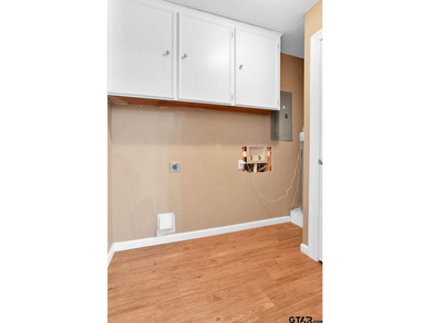 Welcome to this inviting 3-bedroom, 2 bath brick home featuring on Hide-A-Way Lake Golf Course in Texas - for sale on GolfHomes.com, golf home, golf lot