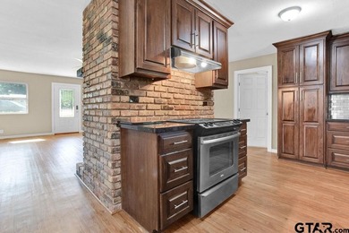 Welcome to this inviting 3-bedroom, 2 bath brick home featuring on Hide-A-Way Lake Golf Course in Texas - for sale on GolfHomes.com, golf home, golf lot