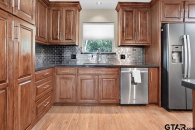 Welcome to this inviting 3-bedroom, 2 bath brick home featuring on Hide-A-Way Lake Golf Course in Texas - for sale on GolfHomes.com, golf home, golf lot