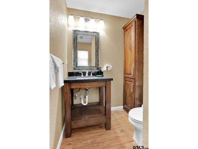 Welcome to this inviting 3-bedroom, 2 bath brick home featuring on Hide-A-Way Lake Golf Course in Texas - for sale on GolfHomes.com, golf home, golf lot