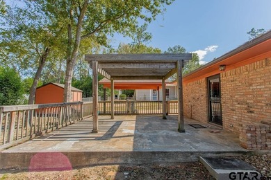 Welcome to this inviting 3-bedroom, 2 bath brick home featuring on Hide-A-Way Lake Golf Course in Texas - for sale on GolfHomes.com, golf home, golf lot