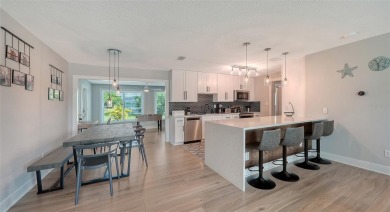 Welcome to a home that feels like it's been pulled straight from on Jacaranda West Country Club in Florida - for sale on GolfHomes.com, golf home, golf lot