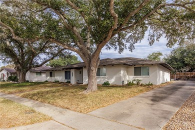 This could be the home for you! Steps away from the first green on Corpus Christi Country Club Golf Course in Texas - for sale on GolfHomes.com, golf home, golf lot