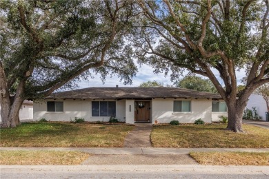 This could be the home for you! Steps away from the first green on Corpus Christi Country Club Golf Course in Texas - for sale on GolfHomes.com, golf home, golf lot