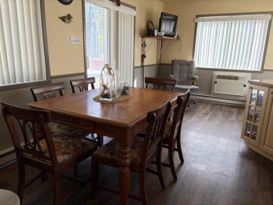 This charming lakeside retreat, offers the perfect opportunity on Willsboro Golf Club in New York - for sale on GolfHomes.com, golf home, golf lot