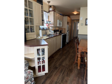 This charming lakeside retreat, offers the perfect opportunity on Willsboro Golf Club in New York - for sale on GolfHomes.com, golf home, golf lot