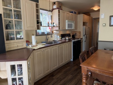 This charming lakeside retreat, offers the perfect opportunity on Willsboro Golf Club in New York - for sale on GolfHomes.com, golf home, golf lot