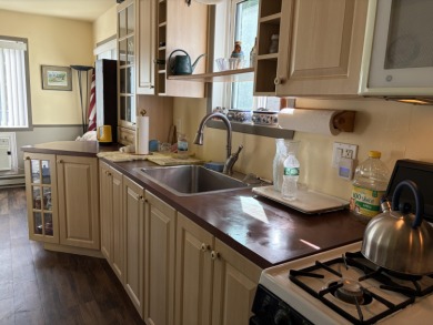 This charming lakeside retreat, offers the perfect opportunity on Willsboro Golf Club in New York - for sale on GolfHomes.com, golf home, golf lot