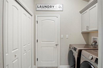 SPECTACULAR 3/2 Sycamore with a SALTWATER POOL, large screened on Stonecrest Golf and Club Club in Florida - for sale on GolfHomes.com, golf home, golf lot