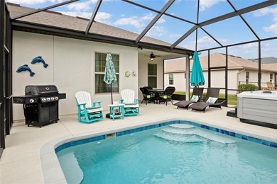 SPECTACULAR 3/2 Sycamore with a SALTWATER POOL, large screened on Stonecrest Golf and Club Club in Florida - for sale on GolfHomes.com, golf home, golf lot