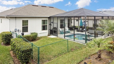 SPECTACULAR 3/2 Sycamore with a SALTWATER POOL, LARGE SCREENED on Stonecrest Golf and Club Club in Florida - for sale on GolfHomes.com, golf home, golf lot