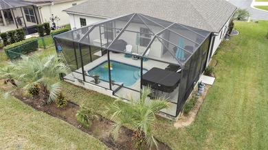 SPECTACULAR 3/2 Sycamore with a SALTWATER POOL, LARGE SCREENED on Stonecrest Golf and Club Club in Florida - for sale on GolfHomes.com, golf home, golf lot