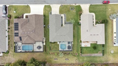 SPECTACULAR 3/2 Sycamore with a SALTWATER POOL, LARGE SCREENED on Stonecrest Golf and Club Club in Florida - for sale on GolfHomes.com, golf home, golf lot