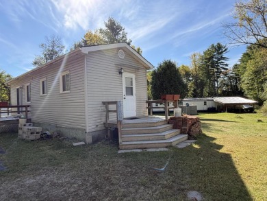 This charming lakeside retreat, offers the perfect opportunity on Willsboro Golf Club in New York - for sale on GolfHomes.com, golf home, golf lot