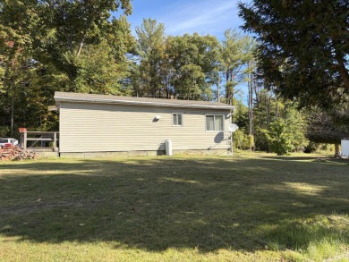 This charming lakeside retreat, offers the perfect opportunity on Willsboro Golf Club in New York - for sale on GolfHomes.com, golf home, golf lot