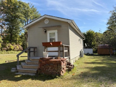 This charming lakeside retreat, offers the perfect opportunity on Willsboro Golf Club in New York - for sale on GolfHomes.com, golf home, golf lot