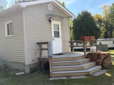 This charming lakeside retreat, offers the perfect opportunity on Willsboro Golf Club in New York - for sale on GolfHomes.com, golf home, golf lot