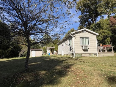 This charming lakeside retreat, offers the perfect opportunity on Willsboro Golf Club in New York - for sale on GolfHomes.com, golf home, golf lot