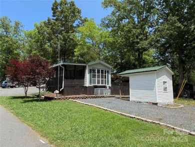 Welcome to 102 Papoose Ct. This 1999 Park Model is in great on The Tillery Tradition Country Club in North Carolina - for sale on GolfHomes.com, golf home, golf lot