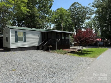 Welcome to 102 Papoose Ct. This 1999 Park Model is in great on The Tillery Tradition Country Club in North Carolina - for sale on GolfHomes.com, golf home, golf lot
