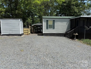Welcome to 102 Papoose Ct. This 1999 Park Model is in great on The Tillery Tradition Country Club in North Carolina - for sale on GolfHomes.com, golf home, golf lot