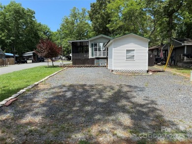 Welcome to 102 Papoose Ct. This 1999 Park Model is in great on The Tillery Tradition Country Club in North Carolina - for sale on GolfHomes.com, golf home, golf lot