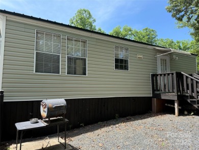 Welcome to 102 Papoose Ct. This 1999 Park Model is in great on The Tillery Tradition Country Club in North Carolina - for sale on GolfHomes.com, golf home, golf lot