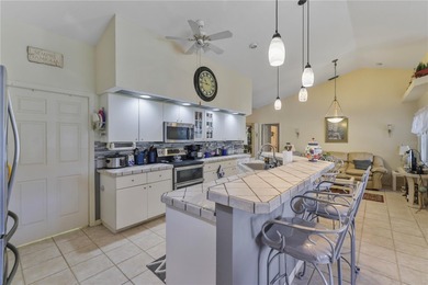 Welcome to this beautifully maintained one-owner pool home in on Deep Creek Golf Club in Florida - for sale on GolfHomes.com, golf home, golf lot
