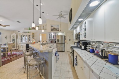 Welcome to this beautifully maintained one-owner pool home in on Deep Creek Golf Club in Florida - for sale on GolfHomes.com, golf home, golf lot